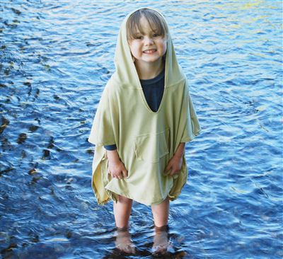 child in poncho