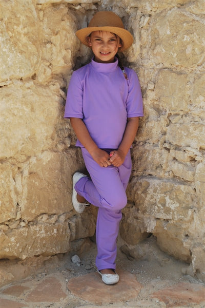 girl in purple trousers